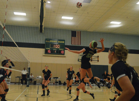 Photo by Kendall Paige. Sophomore middle/right side hitter, Ashley Taylor, makes a play during their game against Corncordia on August 24.