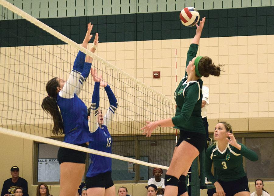 Senior middle hitter Nikki Inquartano goes up for the kill against Lawrence Tech University on Sept. 2 at the Battle of the Boulevard tournament. Point Park lost to the Blue Devils 3-1.