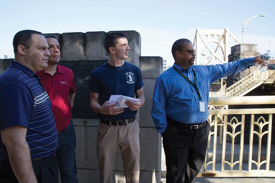 Veterans Edwin Hernandez, Ron Wyley and Jason Brown, along with Eric Kizina, current army member, explore Pittsburgh during a scavenger hunt to find landmarks as part of the Veterans Joint Leadership Initiative.  