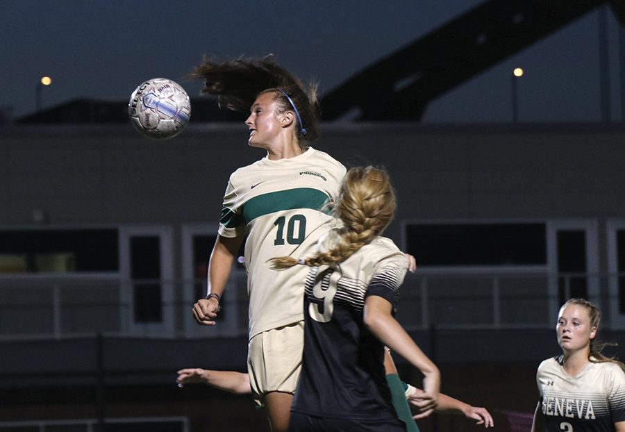 Junior midfielder, Izzy Hunter, heads the ball to pass to her teammate verses Geneva. Point Park won this game 4-0. The Pioneers have a record of 4-6-2. Their next game is on Thursday at 2:30 PM against Ohio Catholic.