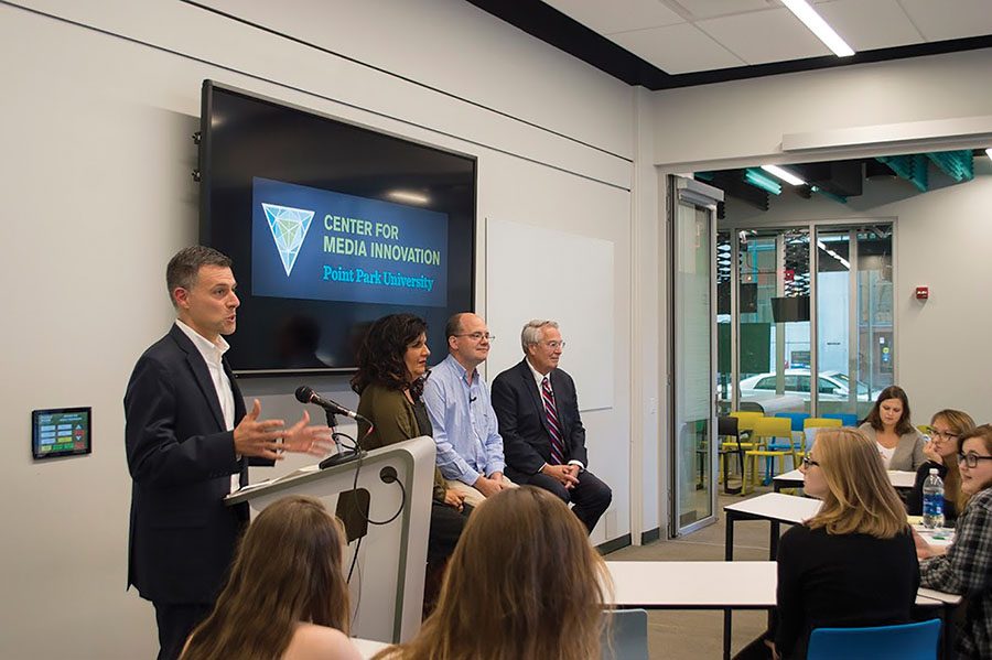 CMI Director Andrew Conte introduces local journalists Salena Zito, Chris Potter and Jon Delano for a panel about their stories covering the presidential campaign trail Tuesday, Sept. 27 in the CMI. 