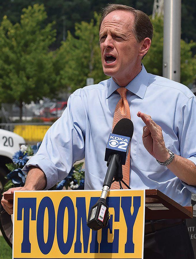 Senator Pat Toomey speaks about police access to federal equipment during a small campaign talk at the Law Enforcement Memorial on June 27. 