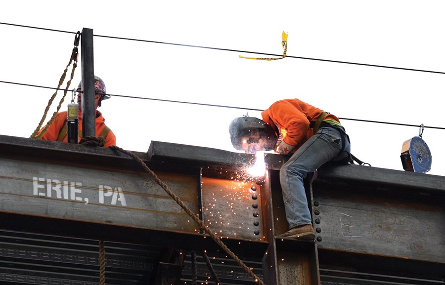 A construction worker welds a part of the Point Park Playhouse Friday afternoon. The playhouse is projected to open in 2018. 