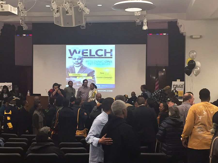 Attendees get their pictures taken with mayoral candidate John C. Welch after he finishes his speech announcing his candidacy for mayor of Pittsburgh, Saturday Jan. 21. 