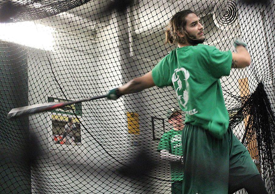 Freshman Andrew Herrera practices batting at the cages in the Student Center. The Point Park baseball team will head to Winter Haven, Fla. during spring break to begin its 2017 campaign.