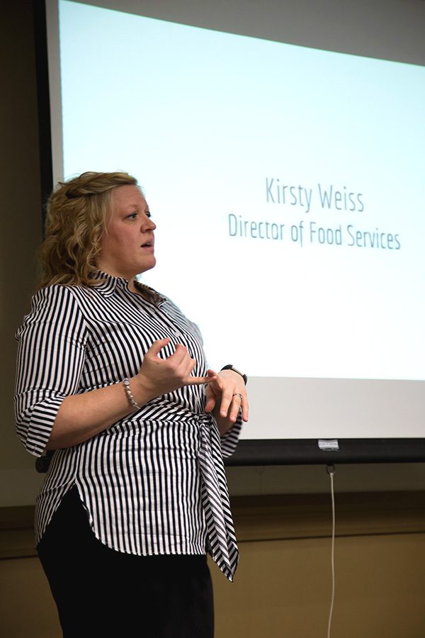 Kristy Weiss, director of dining services, discusses student complaints and recent food service changes during the current transition period at CulinArt, at a USG meeting Monday. 