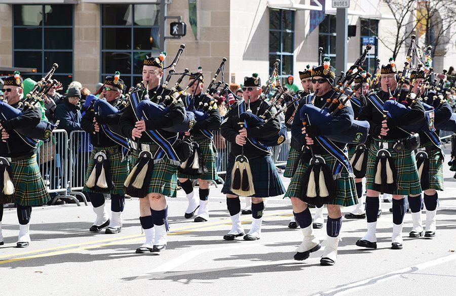 A group of bag pipers march along Boulevard of the Allies during Pittsburgh’s annual Saint Patrick’s Day parade on Saturday. 
