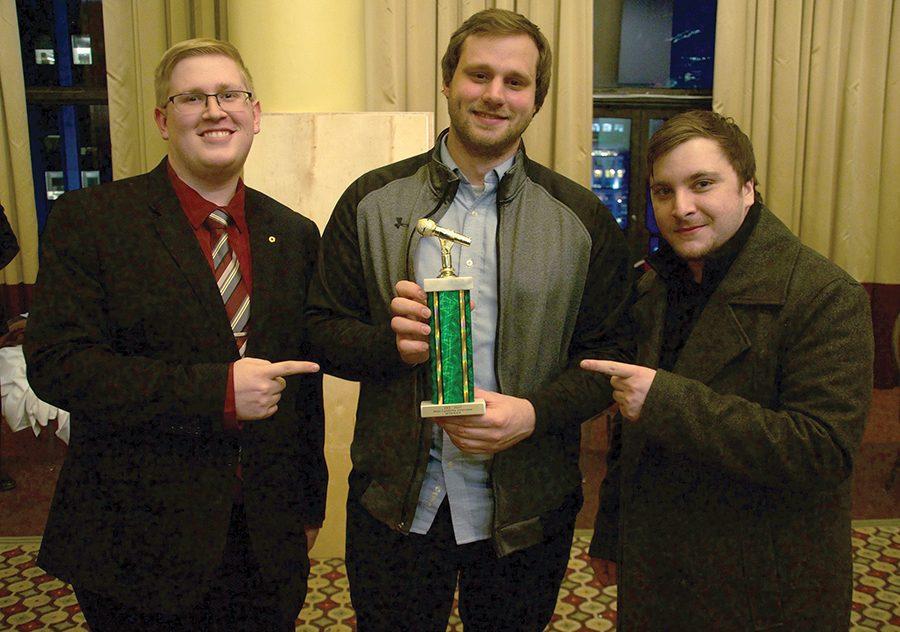 Alexander Popichak, Vinnie Ferrainola and Brandon Cross pose with their trophy for best celebrity 
interview at the Intercollegiate Broadcast System Awards in New York City Saturday, March 4.