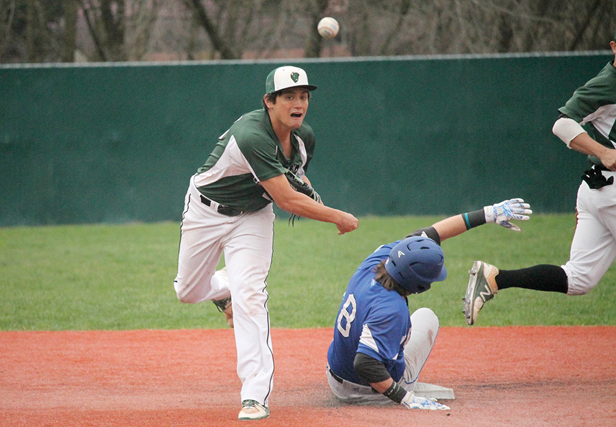 Addison Domingo throws to first to try and complete a double play two weeks ago. Domingo played second base at Midway last weekend and also earned a win and two saves on the mound.