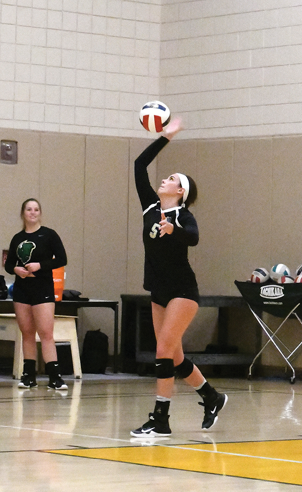 Junior outside hitter Meg Reineke serves to Pitt-Johnstown at the home-opener last Tuesday. Reineke collected 12 kills, 12 digs and two assists.
