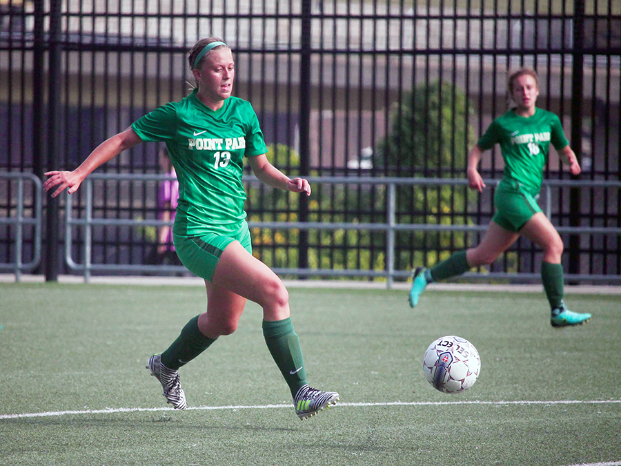 Freshman midfielder, Bailey Boyd, advances the ball up the field during a game against the University of Pikeville on Sept. 16. The Pioneers won 5-0.