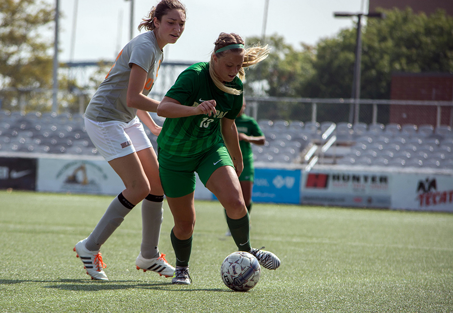 Freshman+midfield%2Fforward+Bailey+Boyd+keeps+possession+of+the+ball+away+from+an+opposing+player+at+the+Saturday%2C+Sept.+16+home+game.+The+Pioneers+beat+University+of+Pikeville+5-0+at+Highmark+Stadium.