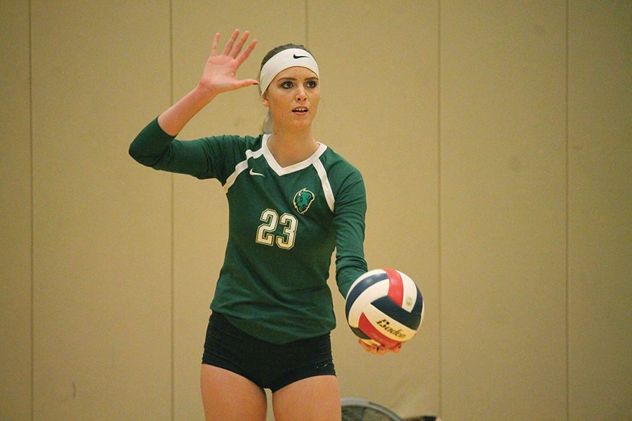 Junior right side hitter Ashley Taylor prepares to serve against IU East last Friday in the Student Center Gym. The Pioneers lost the heart breaker 2-3.
