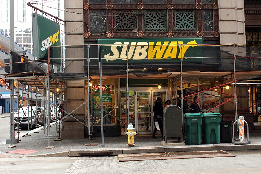 Scaffolding surrounds subway on the corner of Fourth Avenue and Wood Street. Subway is supposed to close in late December. 