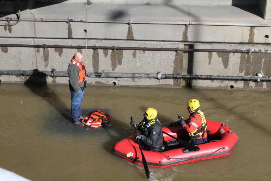 Pittsburgh River Rescue arrives to get Corbin back on land to be evaluated by paramedics. 