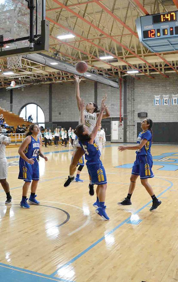 Senior guard Maryssa Agurs drives through the Brescia defense Sunday. She scored 37 points across Point Park’s pair of victories last weekend against IU Southeast (22 points) and Brescia (15 points). 