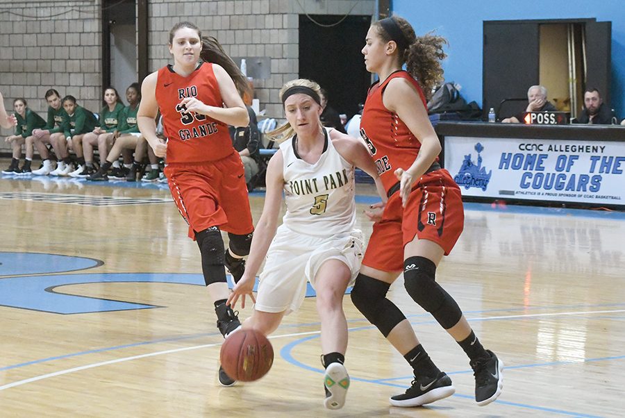 Sophomore guard Baylie Mook drives past a Rio Grande defender the last time the teams met this season. After traveling to Rio Grande Tuesday, the Pioneers have two games left on the regular season.