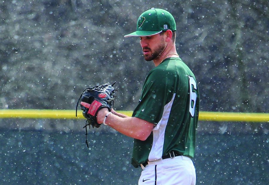 Senior Keenan Smith pitches in relief during Point Park’s home opening game 10-1 win. Last weekend, the team maintained a perfect conference record against Ohio Christian University. 