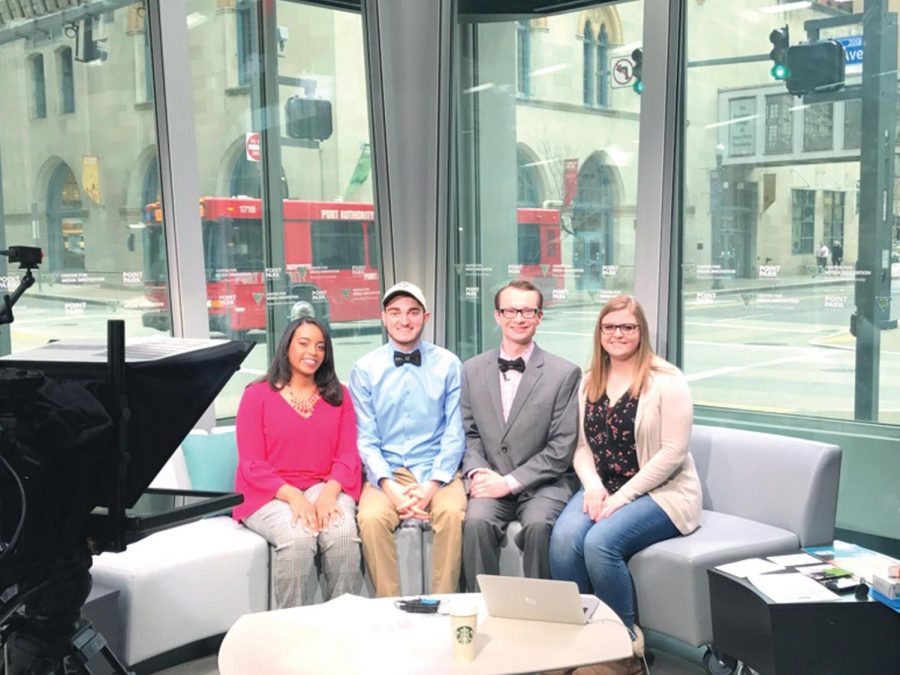 Point Park Students, from left to right, Taylor Fife, Nick Kasisky, Josh Croup and Allison Schubert worked to put together last Thursday’s broadcast in the Center for Media Innovation.