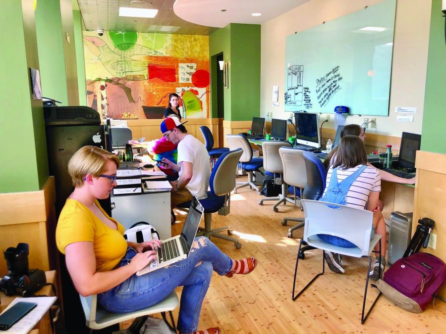 The Globe staff settles into its contemporary newsroom. The new offices, combined with the WPPJ studios, represent a new era for Point Park media. 