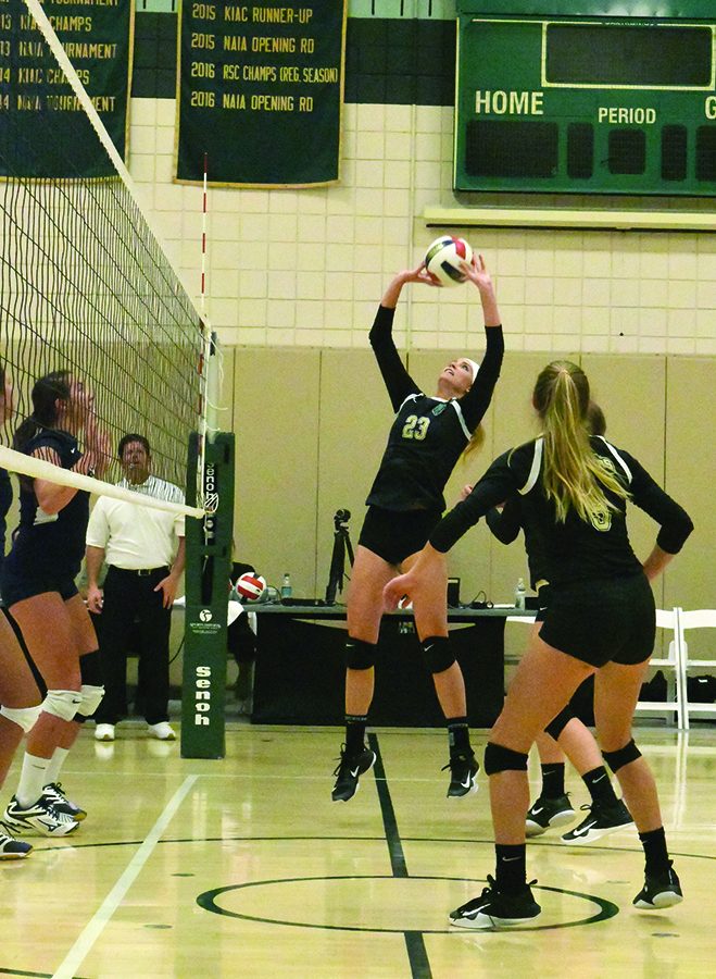 Senior Ashley Taylor sets the ball during a 2017 contest in the Student Center Gym. The Volleyball team holds a 1-3 record and will compete in the Emileigh Cooper Memorial Tournament this weekend in Rio Grande, Oh. 