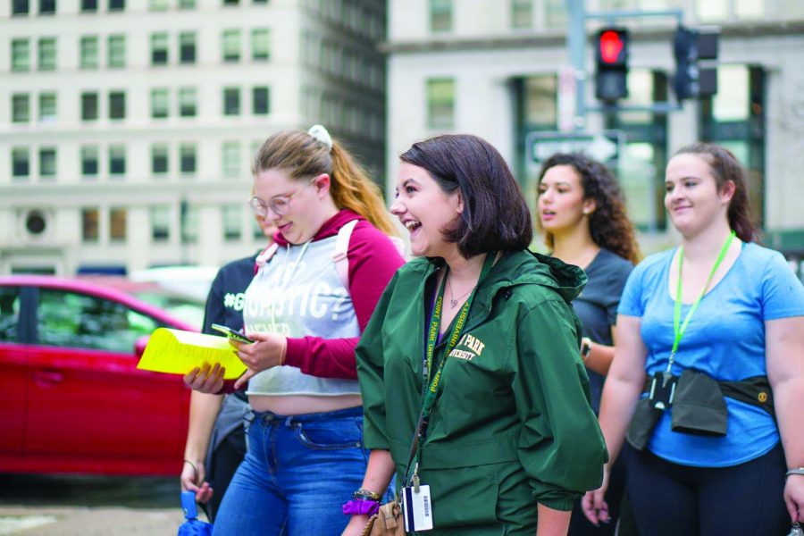 Jenny Hoppes, freshman acting major, strolls through Pittsburgh with fellow honors students on a scavenger hunt around the city.
