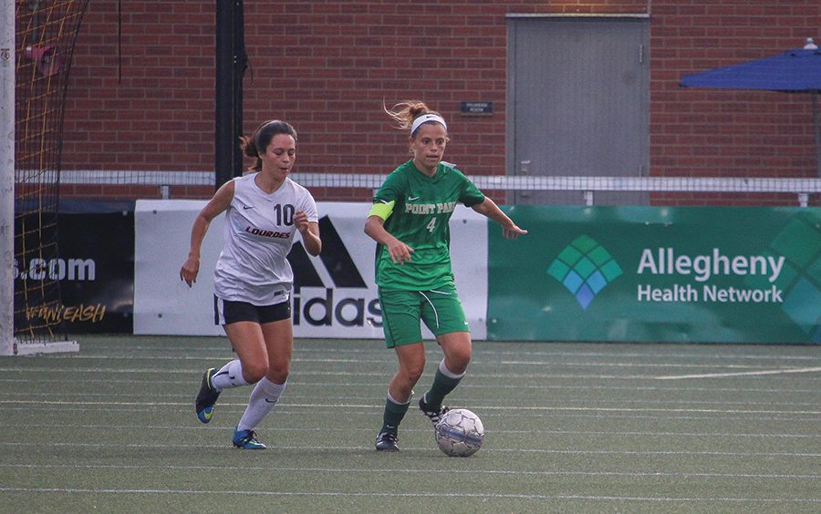 Senior defender Asia Pennock-Franke carries the ball after a steal in a game against Lourdes. The team will face Rio Grande at home Thursday afternoon.