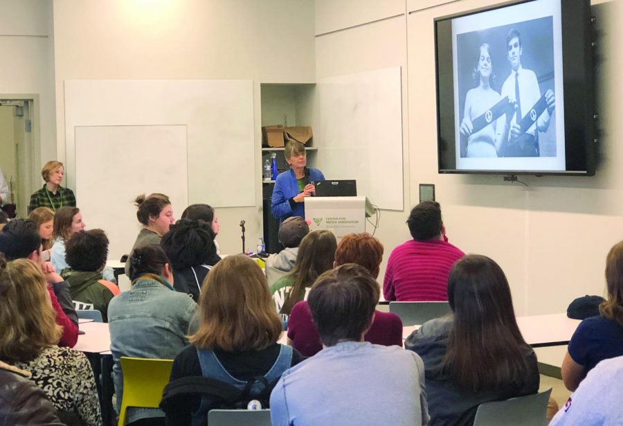 Mary Beth Tinker presents a photo of herself with her iconic armband to students at the CMI.