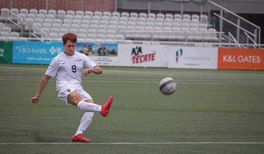 Junior midfielder Tadeo D’Apollo takes a free kick in last week’s 1-0 conference loss facing Rio Grande University. The team tied conference opponent West Virginia Tech University 1-1 Saturday and are back in action Thursday against Ohio Christian University.