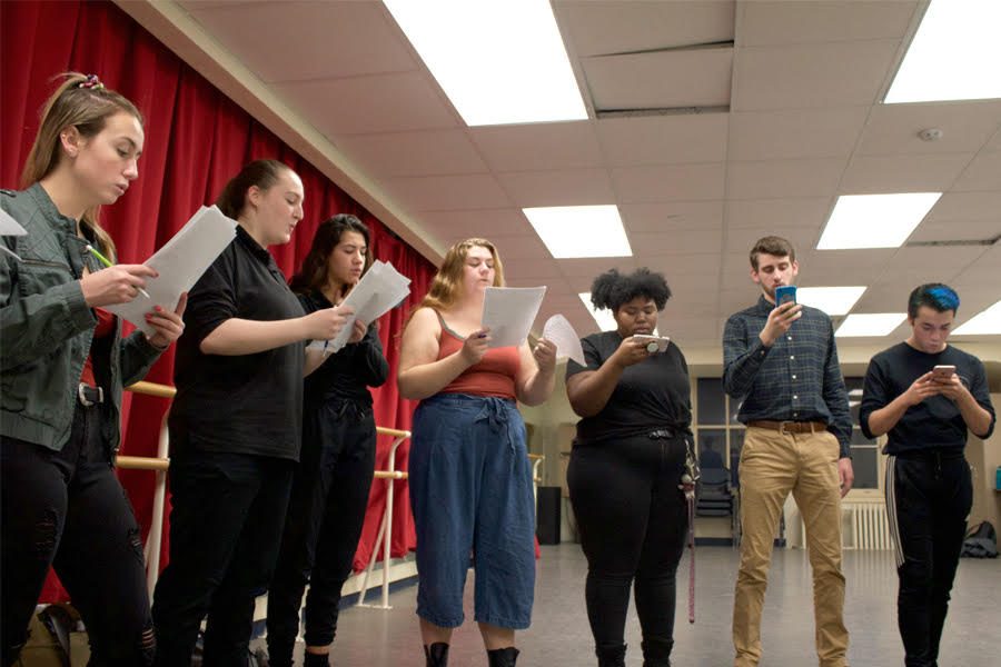 Members of On Point A Cappella rehearse together on Sunday, Oct. 28 on the fifth floor of Lawrence Hall. 