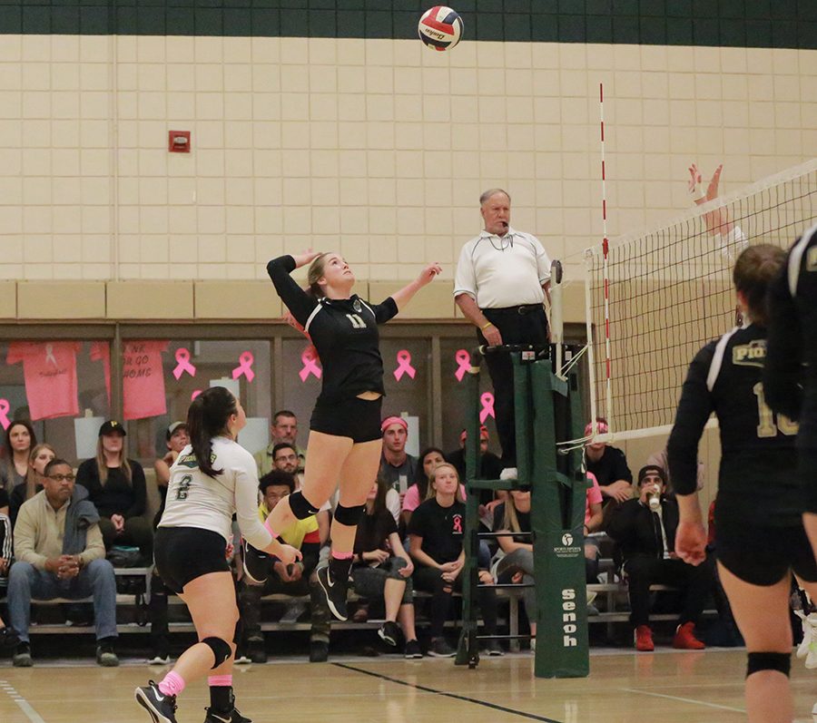 Senior outside hitter Jordan Dixon performs a spike during the team's Dig Pink game Friday night against Indiana University Kokomo. The women lost Friday, but bounced back Saturday night with a win against Cincinnati Christian.