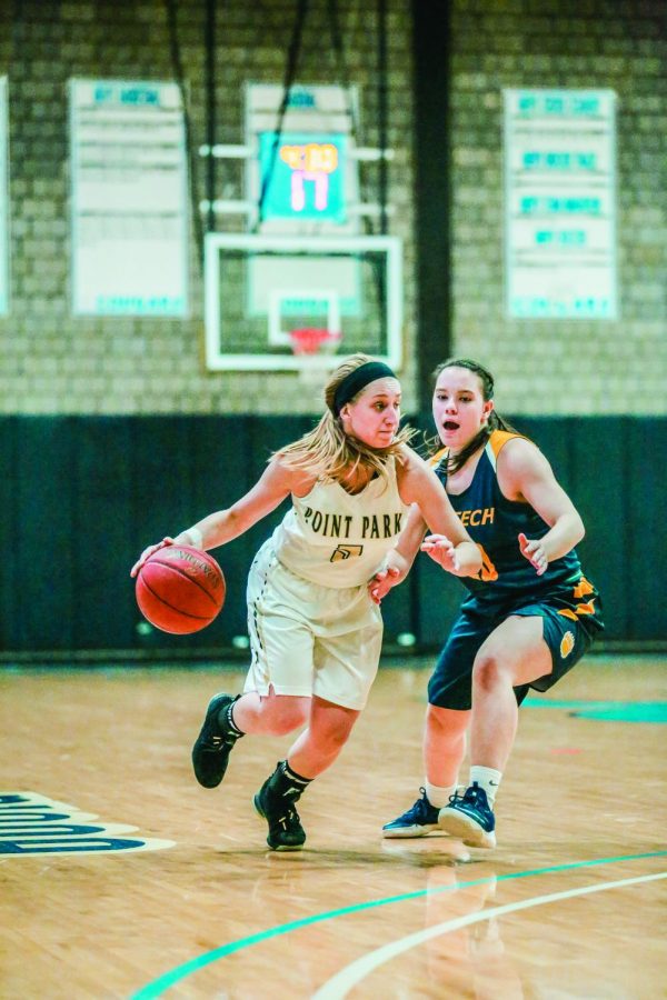 Junior guard Baylie Mook dribbles around a defender during a match-up against WVU Tech earlier this month. The women’s team is now 6-11 overall on the year and 2-4 in conference play.