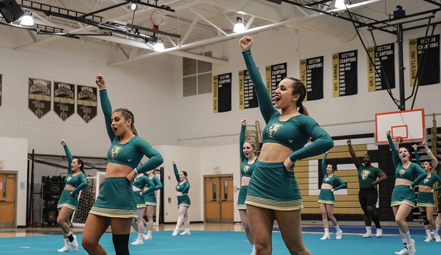 The competitive dance team competes against Aquinas at their first home meet earlier this month. Last weekend, the team ended the day with a score of 85.96 and placed first out of six teams. 