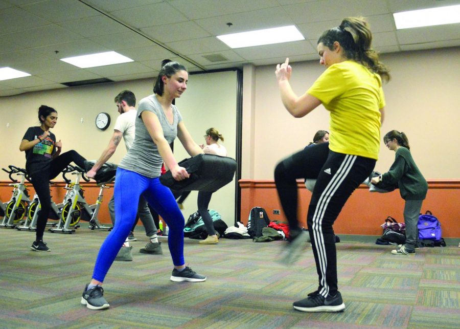 Future Educators of America practiced Krav Maga, an Israeli military form of self-defense. The class brought 22 students into the Student Center Tuesday evening to learn from Kathy Kluk, who has practiced the form for 11 years and is a certified trainer.