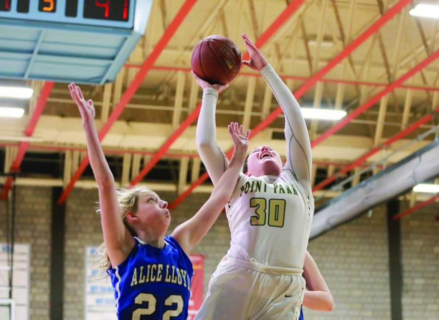 Senior guard Sam Weir attempts a layup during a game earlier this season against Alice Lloyd. Weir totaled 18 points last week against Carlow.