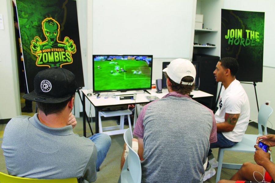 Students play Super Mario Strikers at the tournament hosted by the Rowland School of Business Friday, April 12. 