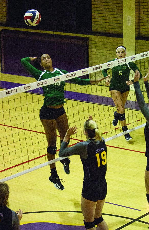 Now-junior middle hitter Jazlyn Rozier goes up for a kill in a game at Carlow last semester as a sophomore. Rozier has 35 kills in 17 sets this season.