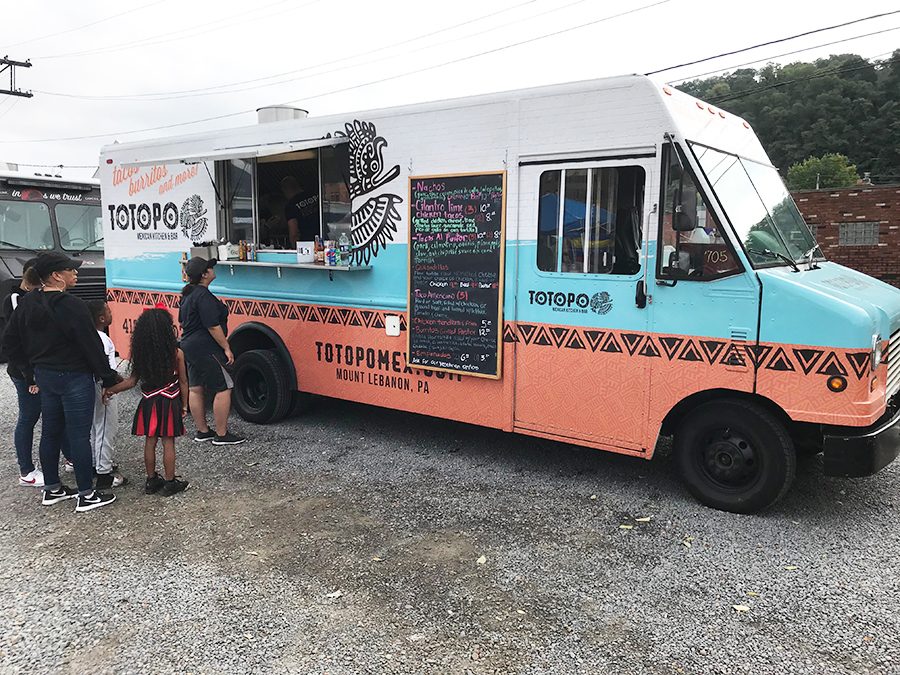 Totopo was one of nine local food trucks and eight vendors at the Pittsburgh Latino Festival in the Strip District. The festival, the first of its kind in the city, was free to all and had dozens in attendance.  