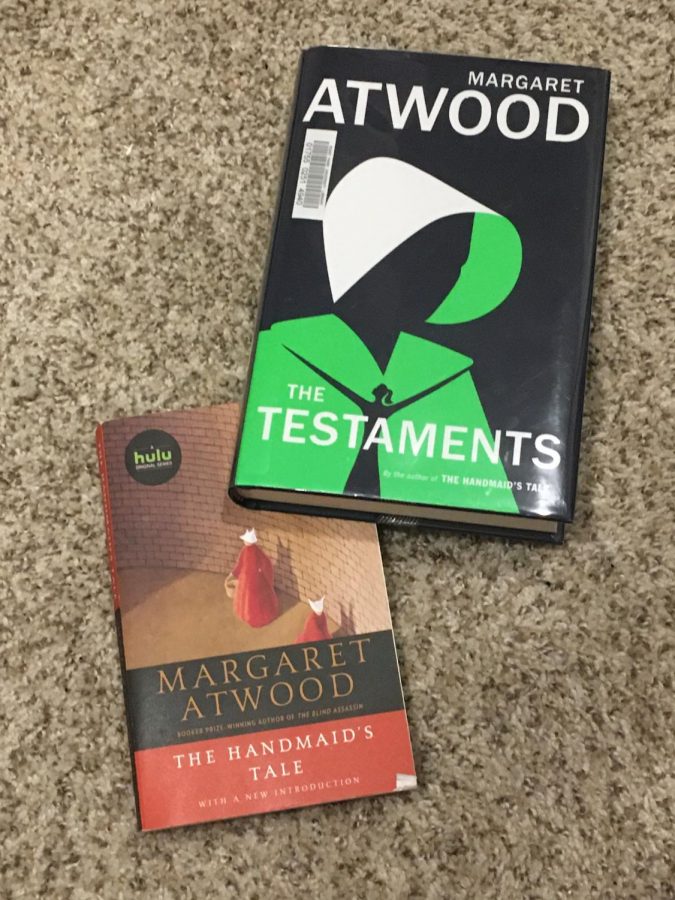 Margaret Atwood’s original novel, “The Handmaid’s Tale” pictured with her sequel, “The Testaments,” published 35 years later.