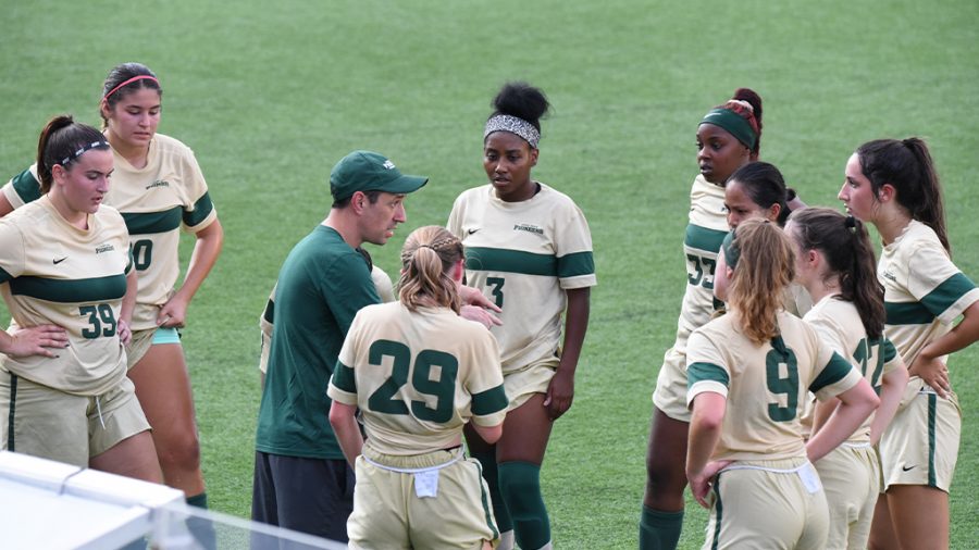 Women’s soccer head coach John Newbery coaching the team during a recent game. (Photo courtesy of  Point Park Athletics)
