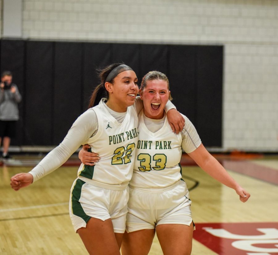 Senior guard Sierra Seneta (right) and freshman guard Alexis Giles (left) celebrate their win over SMWC. They face Midway on the road on Wednesday, February 22. 