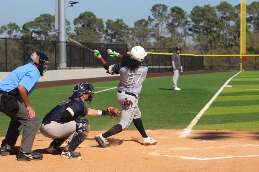 Junior Catch Michali Brito hits a shot to Centerfield against Judson in the Pioneers sweep of RussMatt Invitational