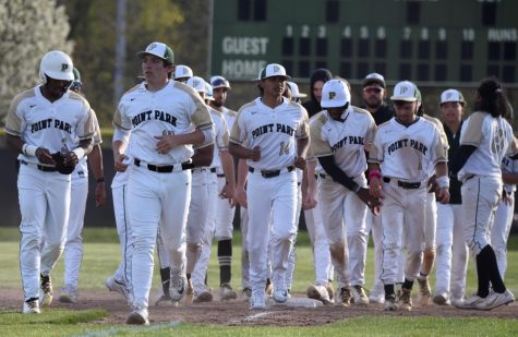 Photo courtesy of Kevin Taylor. 
The Point Park baseball team walking off the field after their walk off victory against Seton Hill on April 11. 