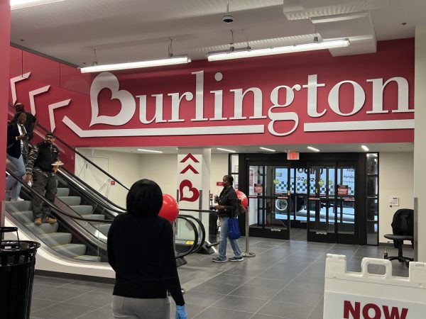 Shoppers enter the new Burlington on opening day, one of several newer stores Downtown in recent years.