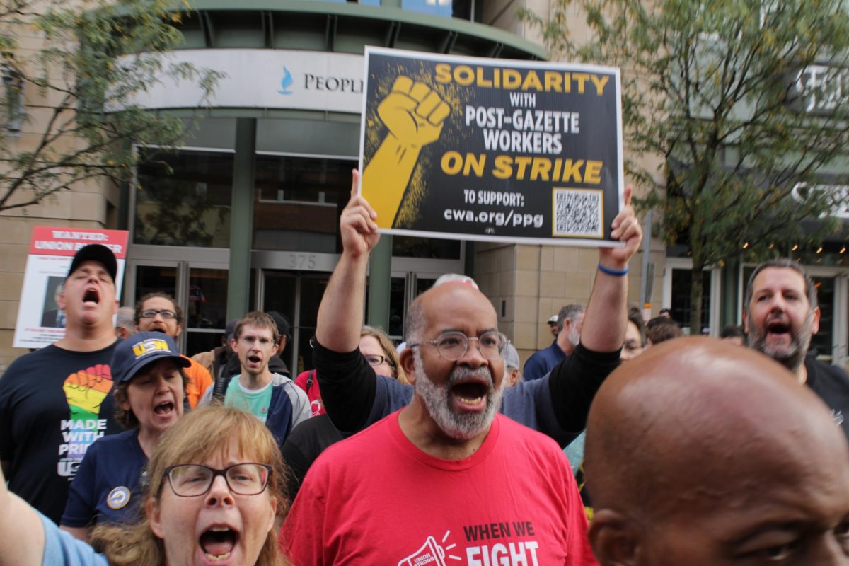 Members of local unions gather outside the Post-Gazette office last Friday to mark one year since workers have been on strike. 