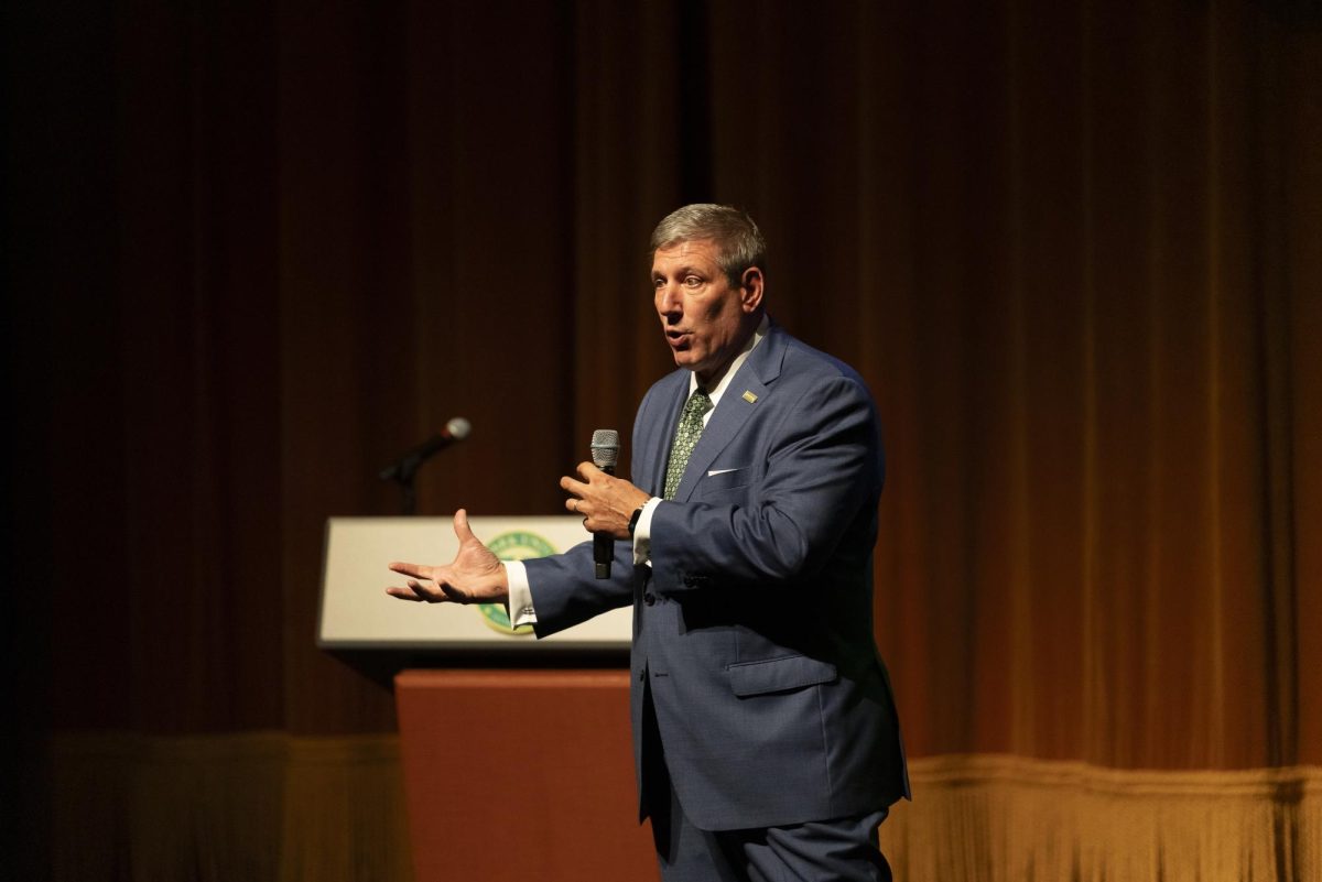 President Chris Brussalis speaks Monday in the PNC Theatre during the announcement presentation of the next strategic planning. 