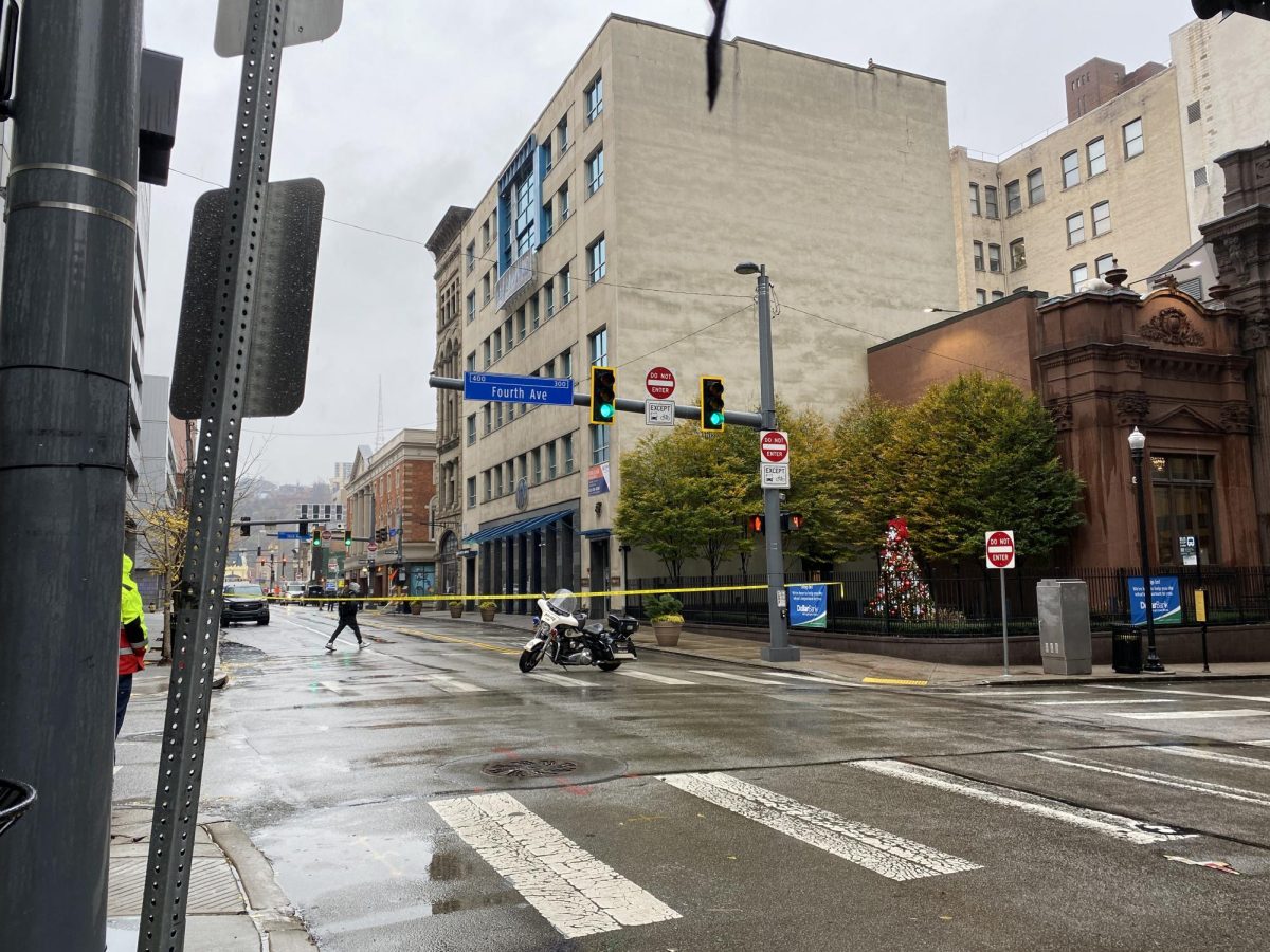City police section off Fourth Avenue and Smithfield Street last Tuesday during Thanksgiving break, when a safety incident occurred that led to negotiations. 