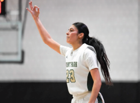 Gillian Piccolino celebrating a made three pointer in a victory from earlier in the season. The women now have a record of 11 wins and three losses.