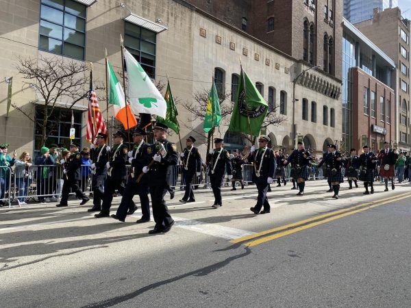 City of Pittsburgh firefighters march down Boulevard of the Allies on Saturday, March 16in the annual St. Patricks Day parade. 