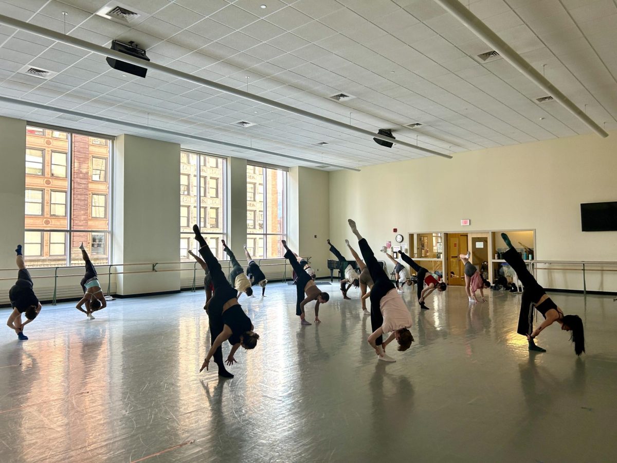 Dancers warm up during a class in the GRW. The program dropped two places in the national rank.